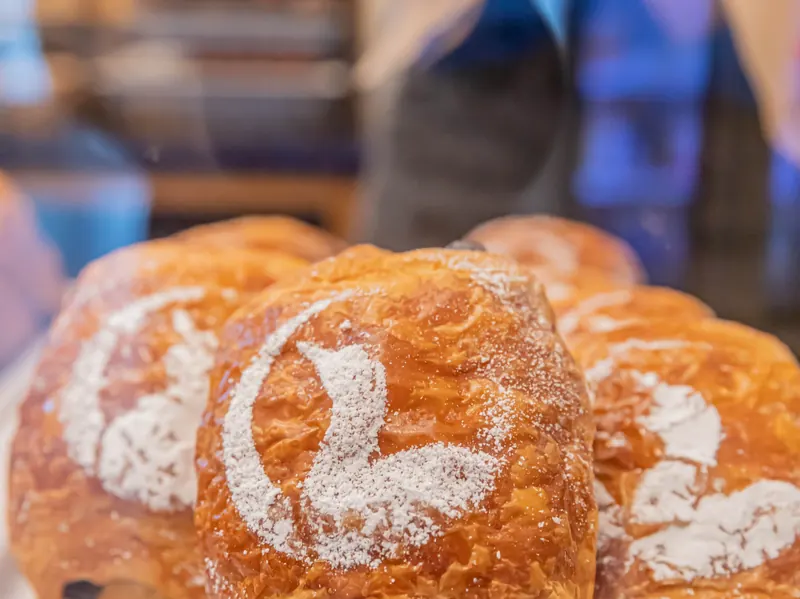 Crusty loaves stenciled with a flour loon, the bakery’s signature